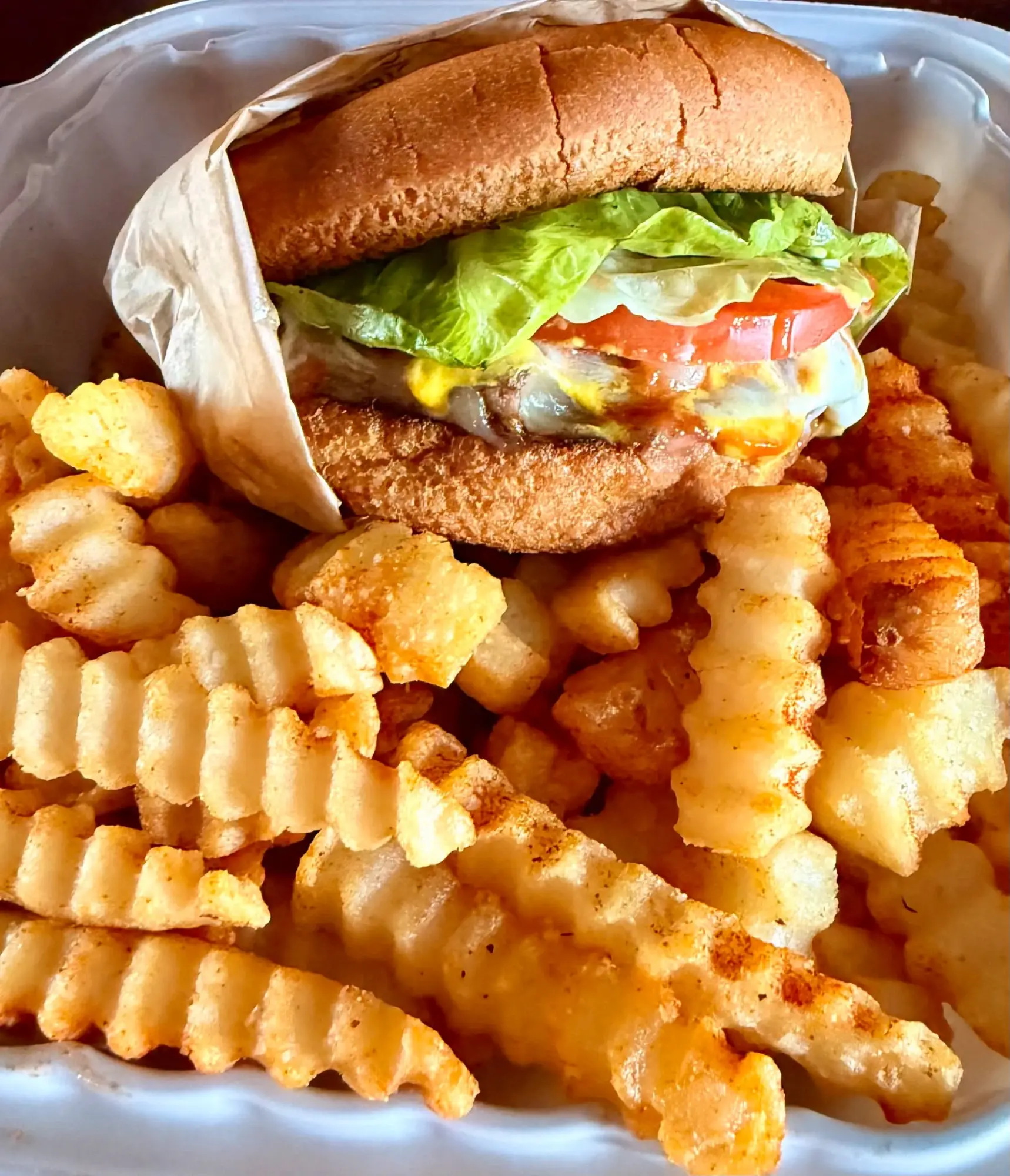 A burger and fries from The Lover's Bite